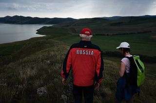 Katarina travelled from Estonia to Siberia to find the village Lugavskaya where her grandmother was deported to in 1949, but it was no longer there. Vladimir, a local tour guide, explained that due to the construction of the hydroelectric station on Yenisey river in the 1970s, around 120 settlements were flooded or relocated.